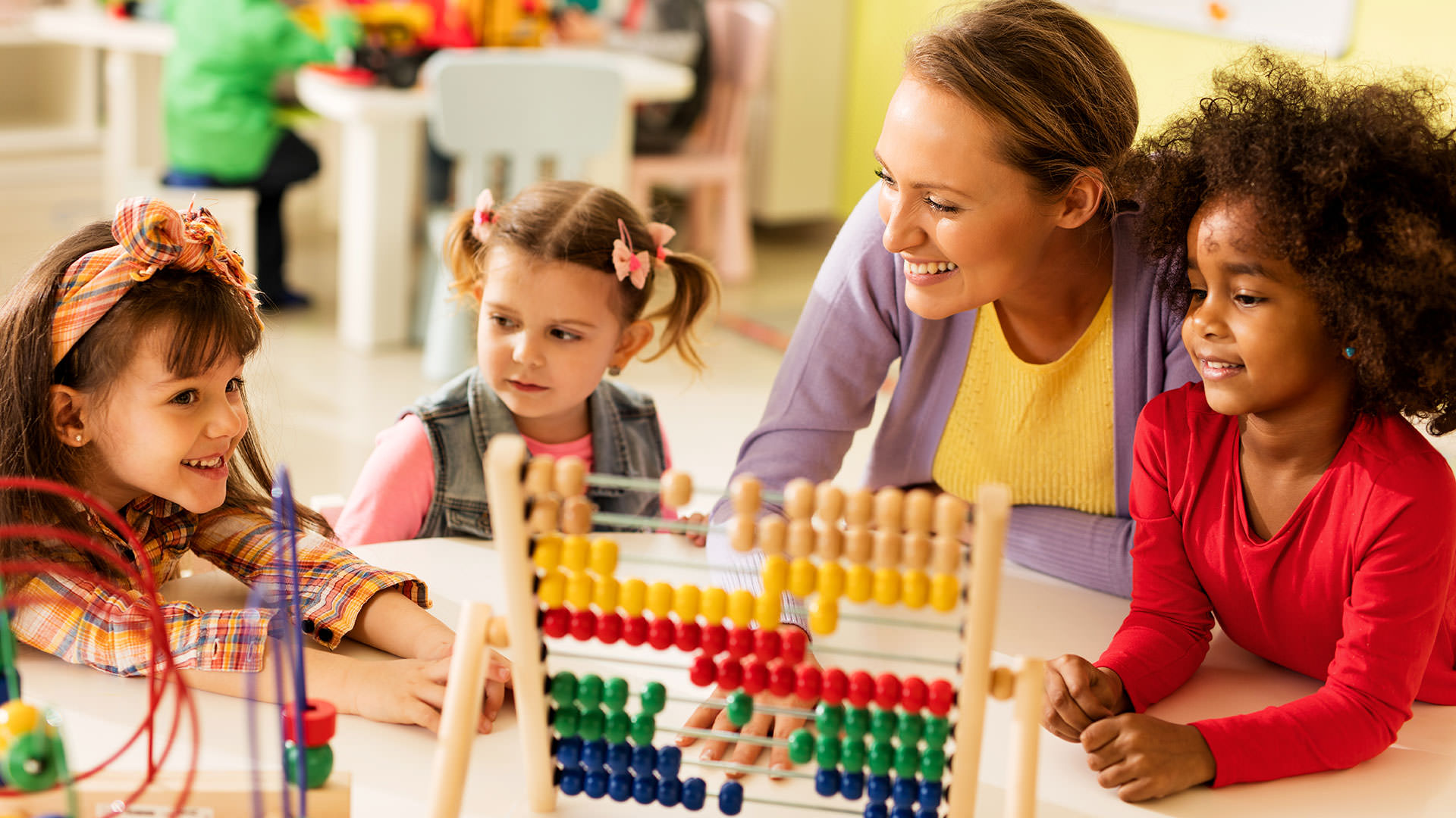 Teacher working with student