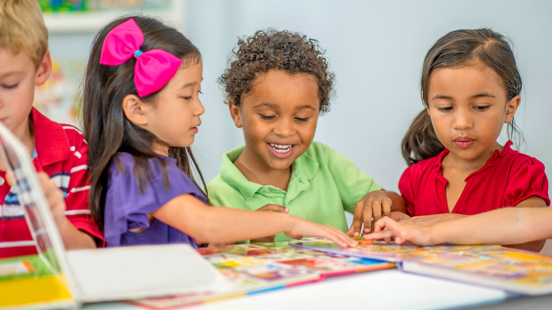 Children smiling while playing together