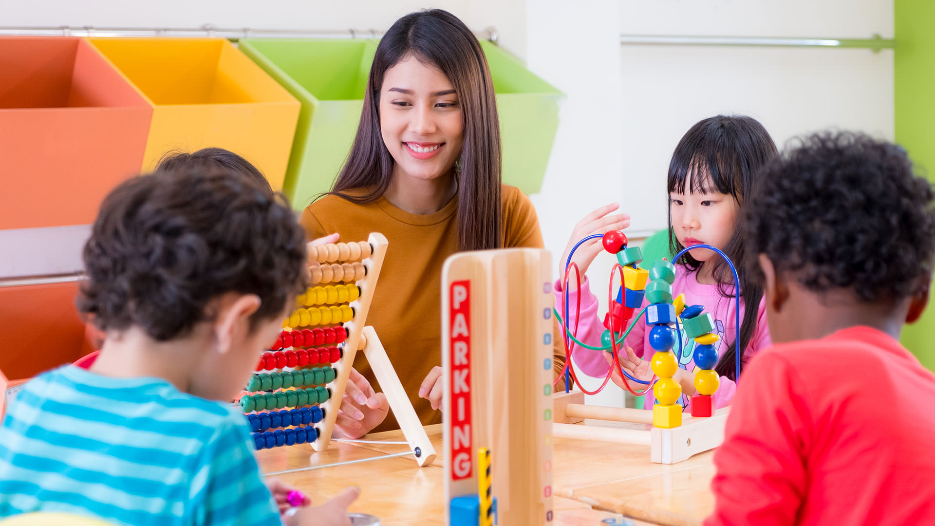 Teacher working with students